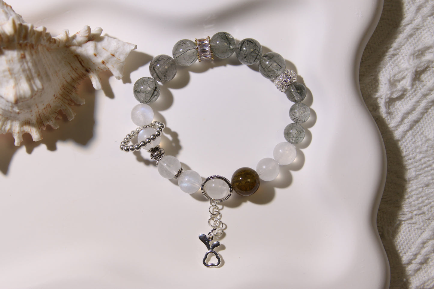 Lunar Whisper Bracelet: A Dance of Mystical Energies[Green Rutilated Quartz, Blue Moonstone, Red Agate]