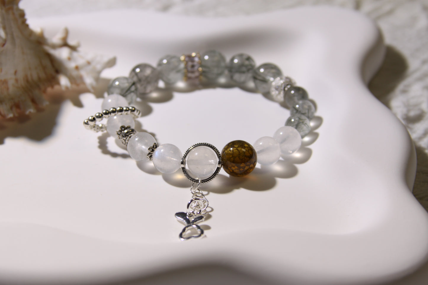 Lunar Whisper Bracelet: A Dance of Mystical Energies[Green Rutilated Quartz, Blue Moonstone, Red Agate]